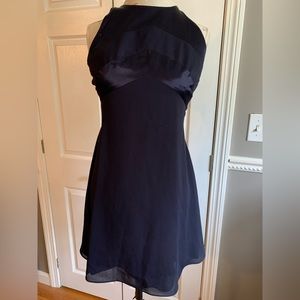 Rhapsody navy dress with criss cross straps.